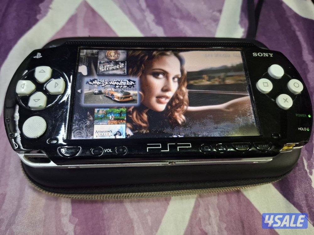 PSP SONY P1000 MODEL.BLACK & WHITE COLOR 8GB SD CARD WITH 50GAMES4