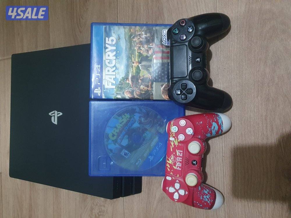 PS4 Pro 1TB + 2 Controllers + 2 Games (Clean Condition)0