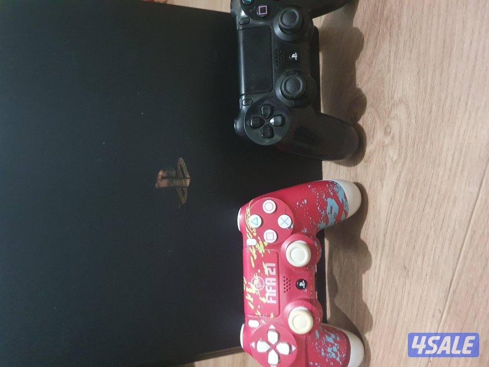 PS4 Pro 1TB + 2 Controllers + 2 Games (Clean Condition)4
