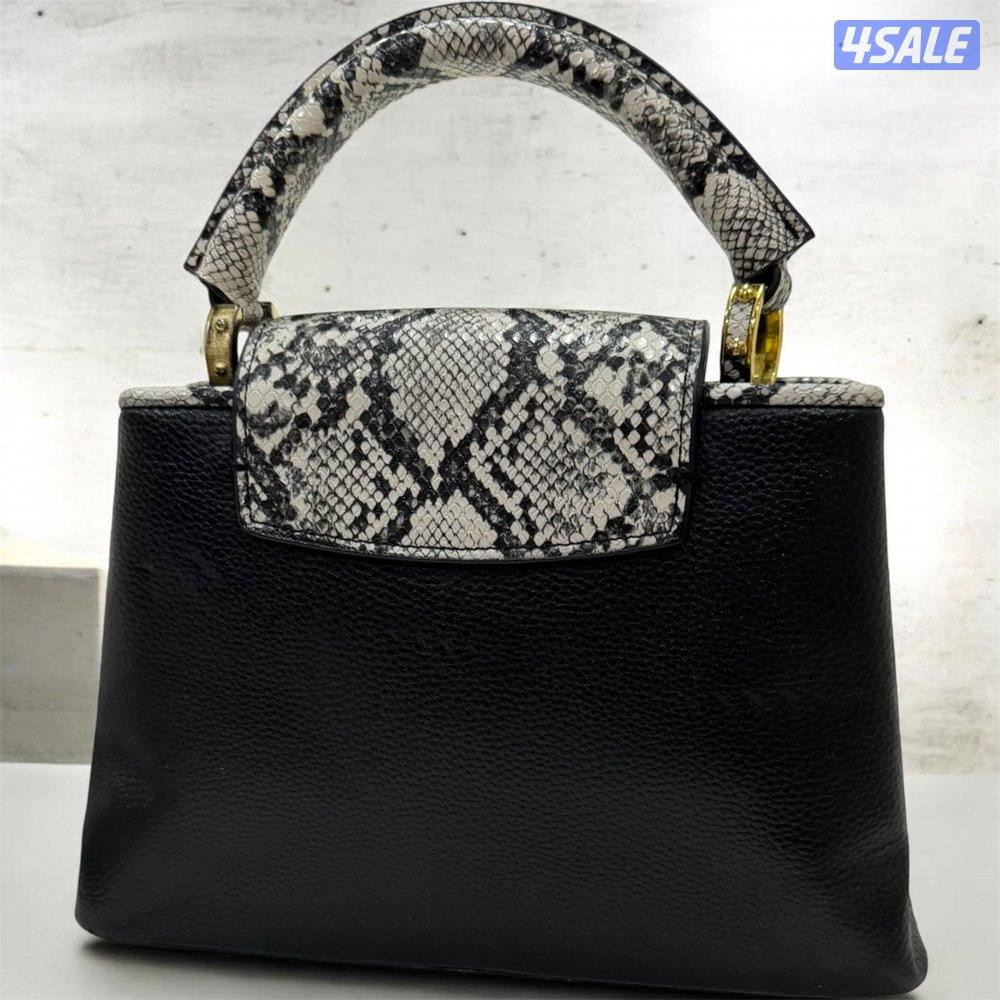 Original lv no accessories .. used but very clean until inside .1