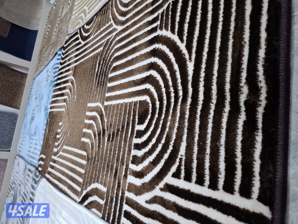 مخازن السجاد والباركية والثيل الصناعي1