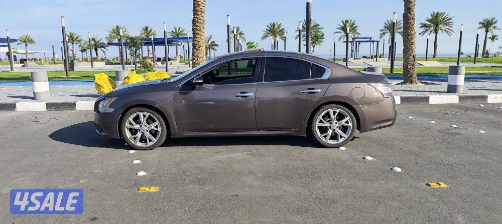 للبيع نيسان ماكسيما موديل 2012 اللون بني من داخل (مخمل بيج ) ماشي 1435