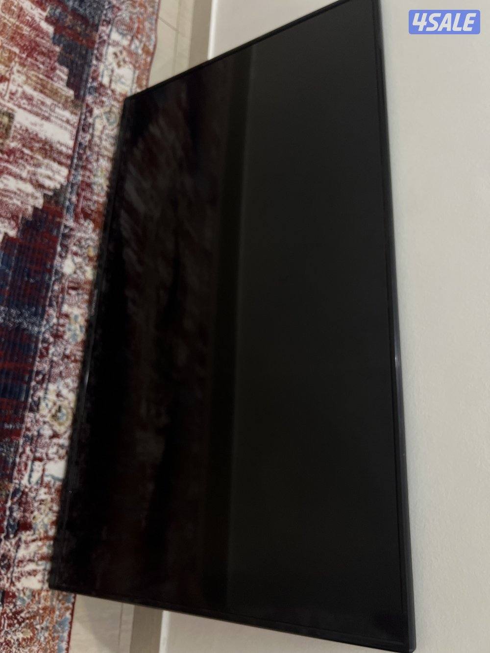 تلفزيون 50 بوصة نظيف مع ستاند بسعر مناسب12