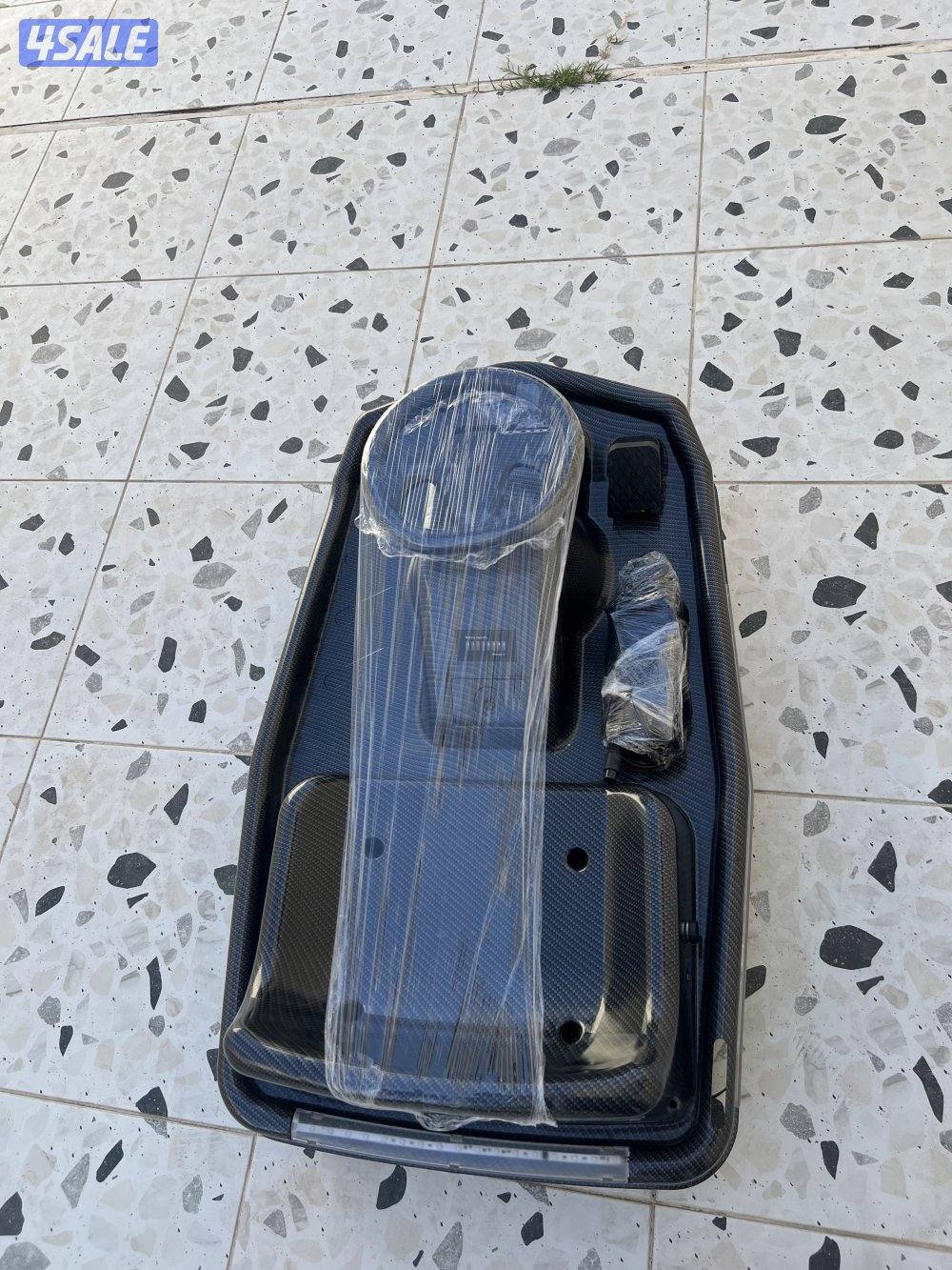 كريزي كارت كاربون  36v السرعة 15-20 وفيه بلوتوث على التلفون ومعاه شاحن1