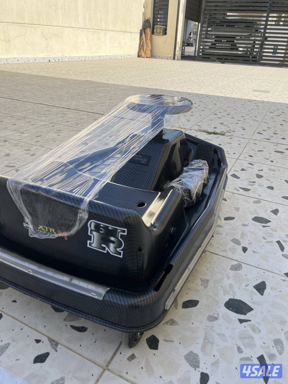 كريزي كارت كاربون  36v السرعة 15-20 وفيه بلوتوث على التلفون ومعاه شاحن3