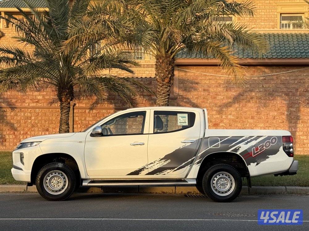 ميتسوبيشي L200 صبغ الوكالة1