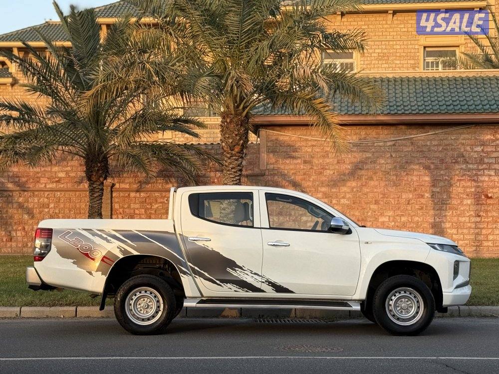 ميتسوبيشي L200 صبغ الوكالة8