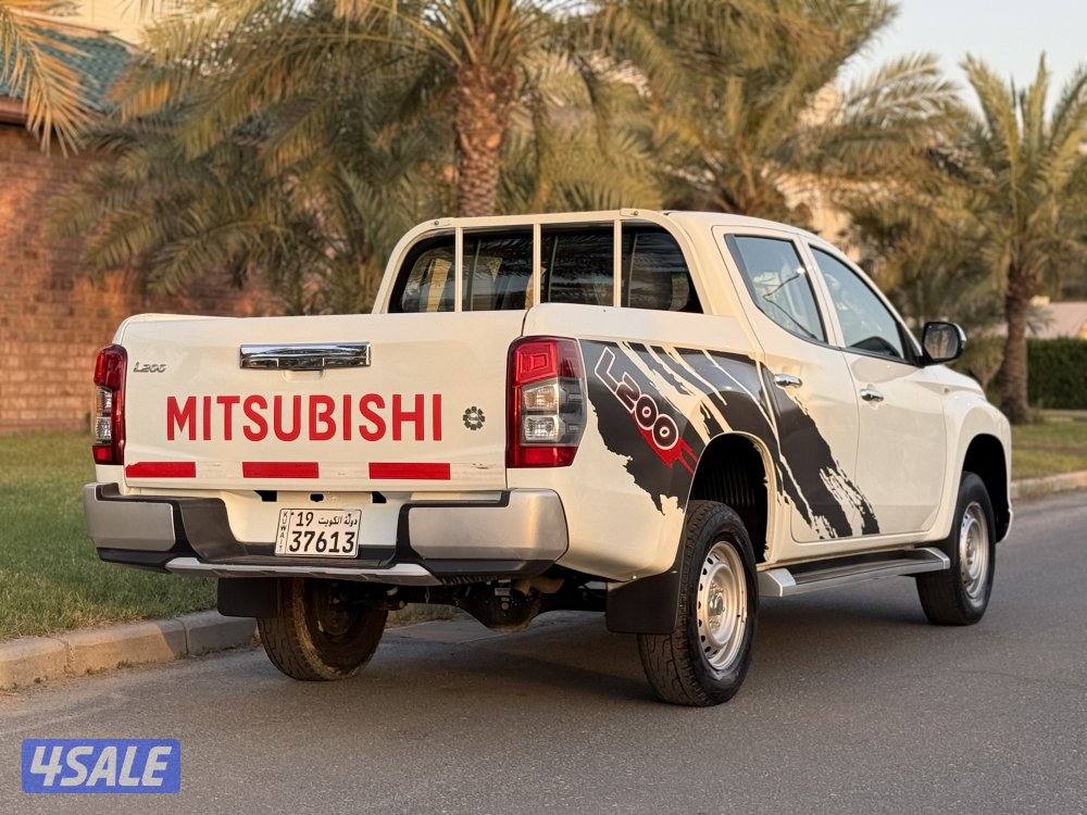 ميتسوبيشي L200 صبغ الوكالة9