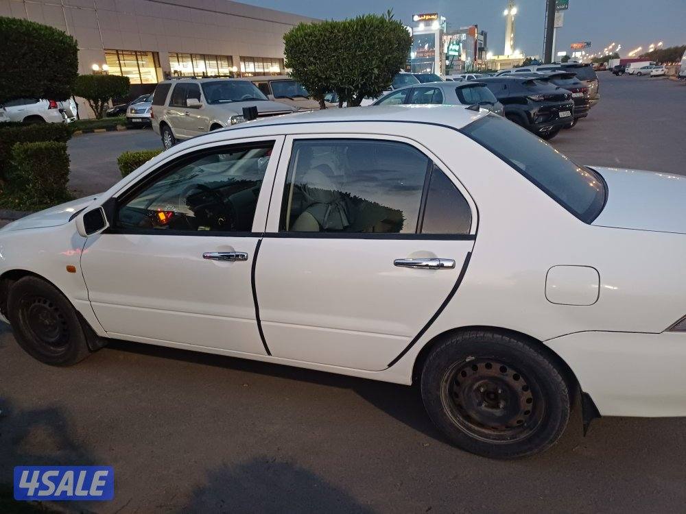 للبيع ميتسوبيشي لانسر موديل  2014  بحاله ممتازه  وشرط الفحص3