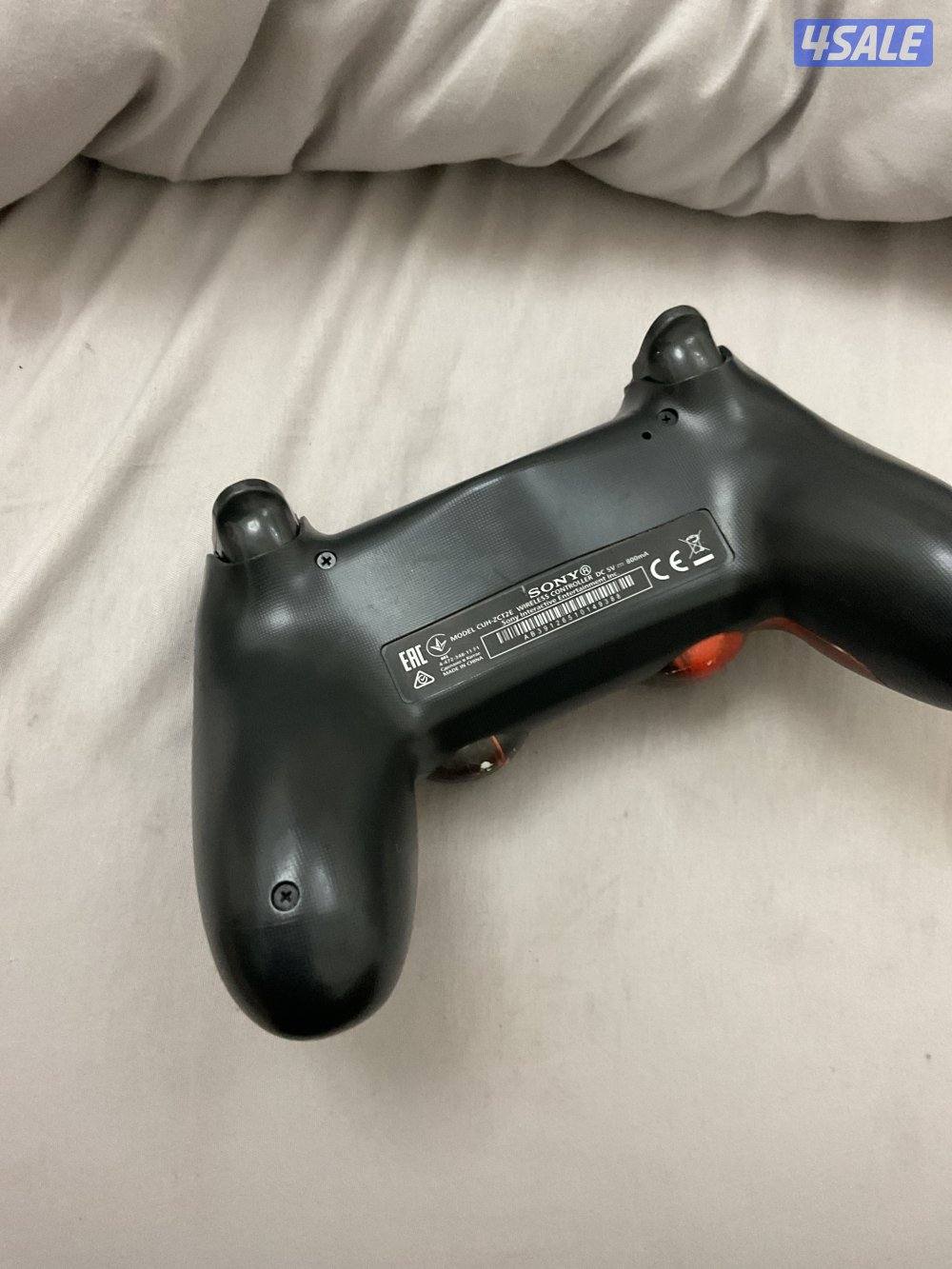 يد سوني 4 جديده وعليه اشكال اصليه1