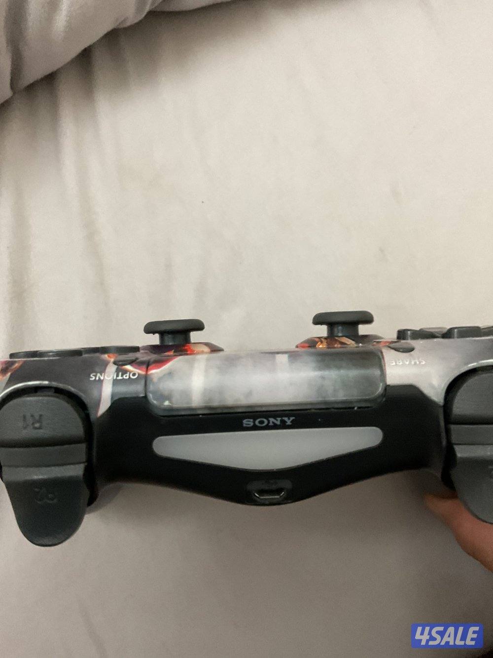 يد سوني 4 جديده وعليه اشكال اصليه2