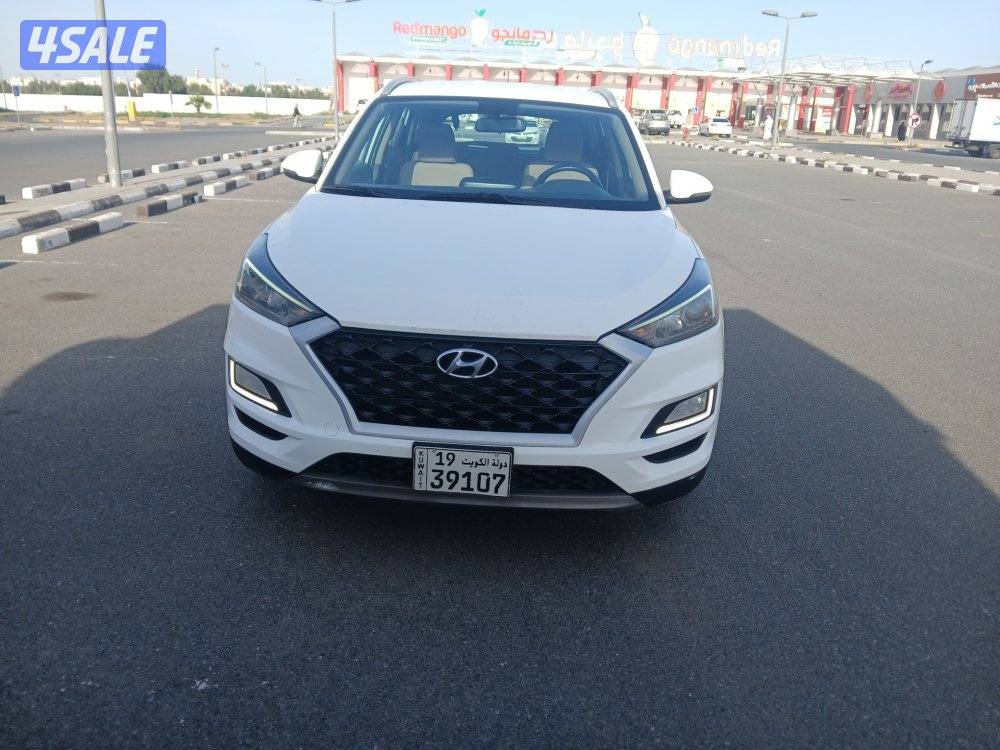 سيارة هيونداي توسان موديل 2021 صبغ وكاله عداد 123الف شرط الفحص0