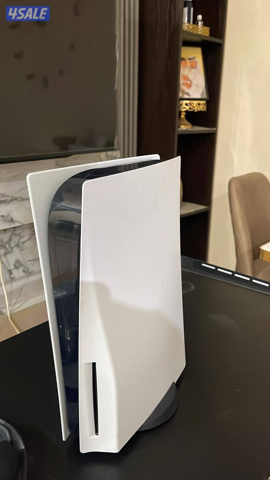 سوني ٥ بحاله ممتازه مع يده احترافيه امورها طيبه0