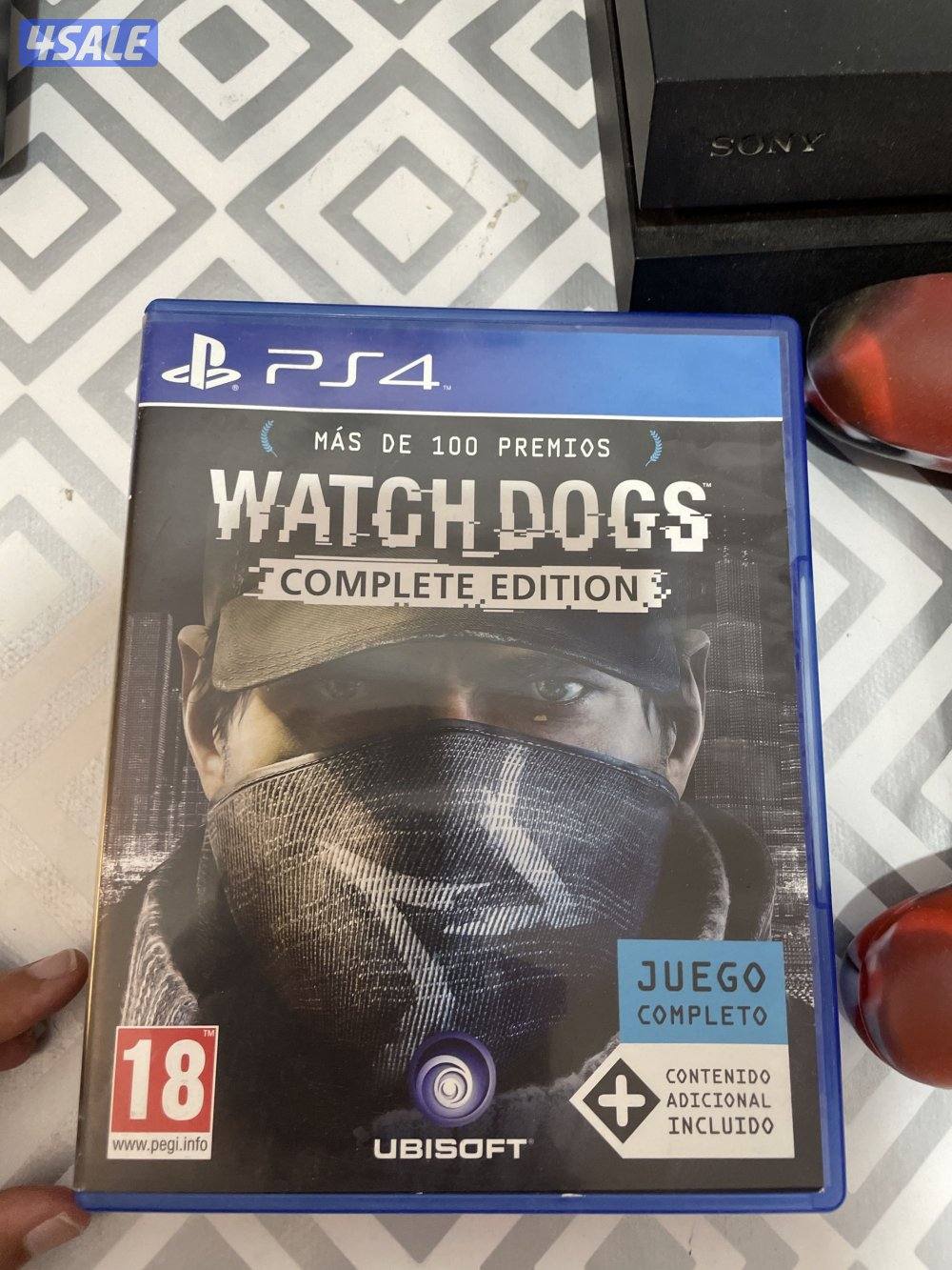 PS4 in good condition with two controllers and cd2