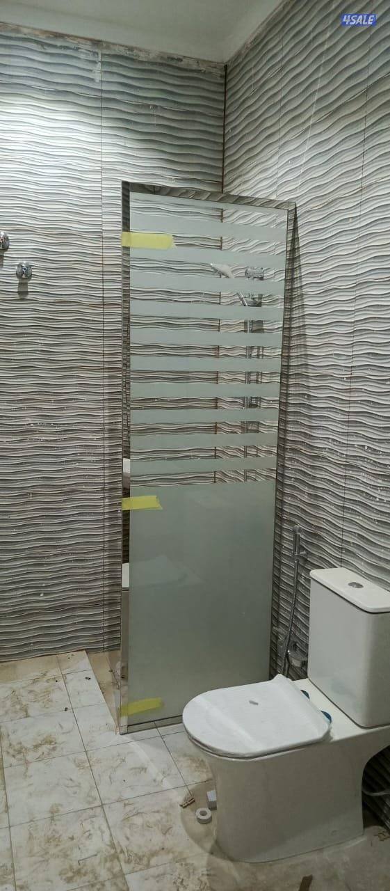 glass portion.  shawarbox. glass  door.. belcona.  glass. ralling.9