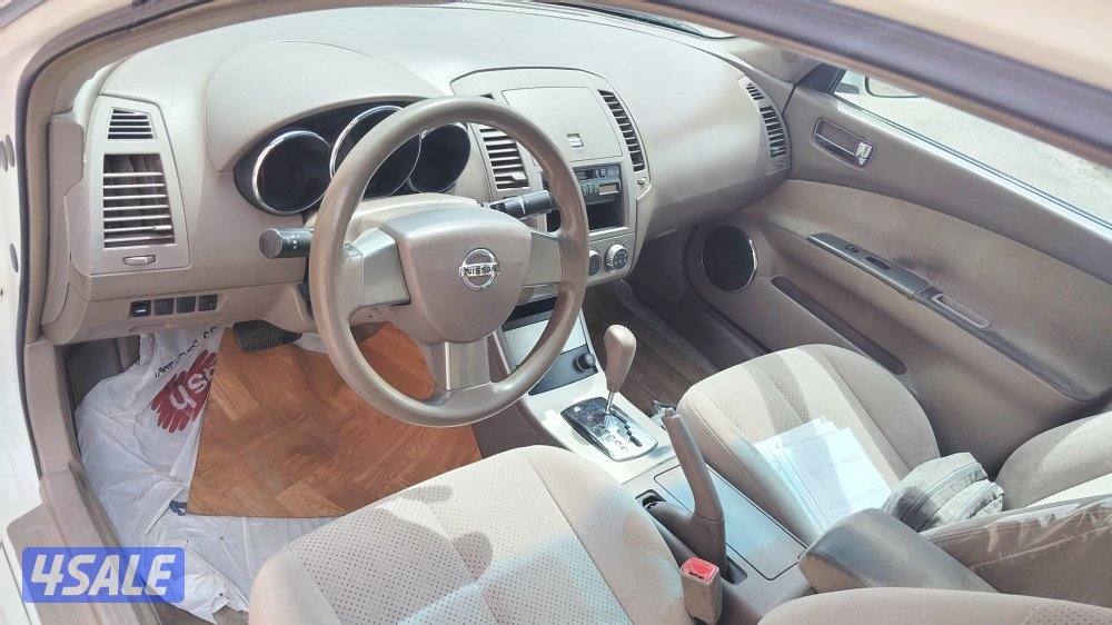 التيما 2004 لون ابيض المالك الاول3