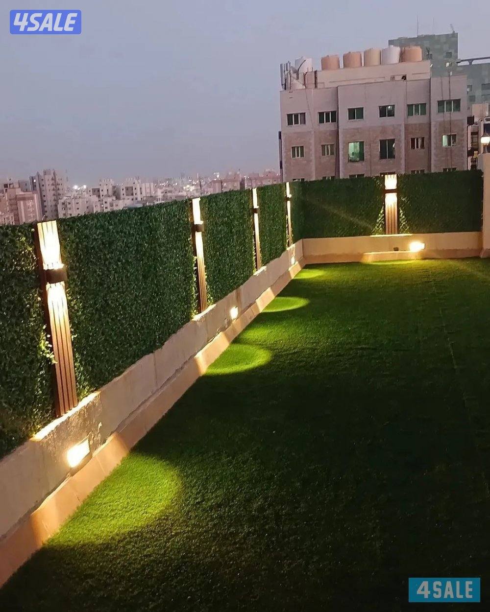 تركيب الثيل الصناعي وتركيب السياج التركي وقص الاشجار3