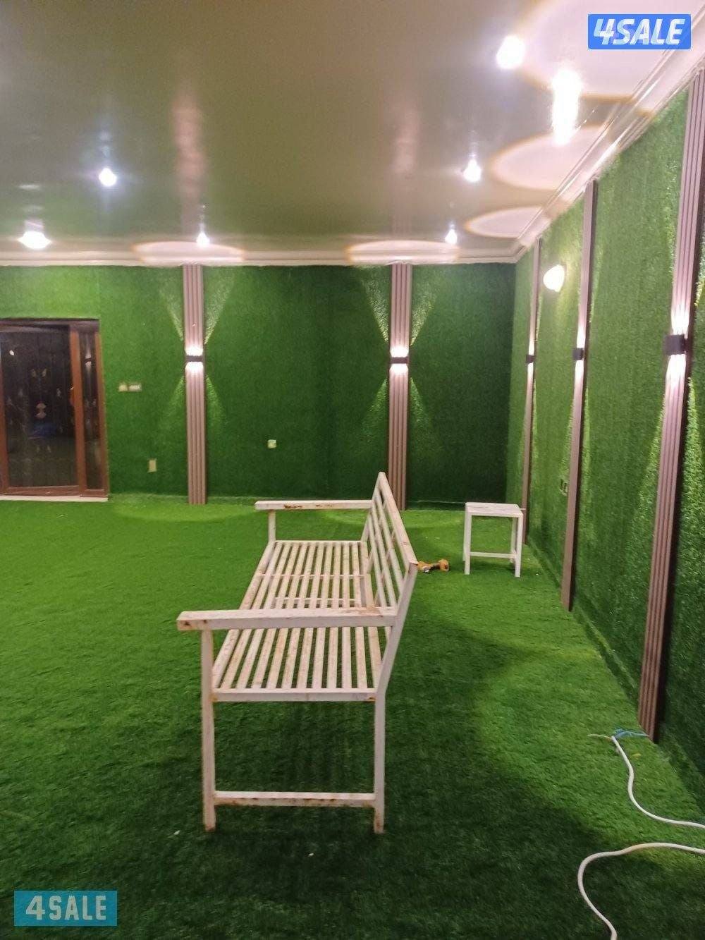 تركيب الثيل الصناعي وتركيب السياج التركي وقص الاشجار8