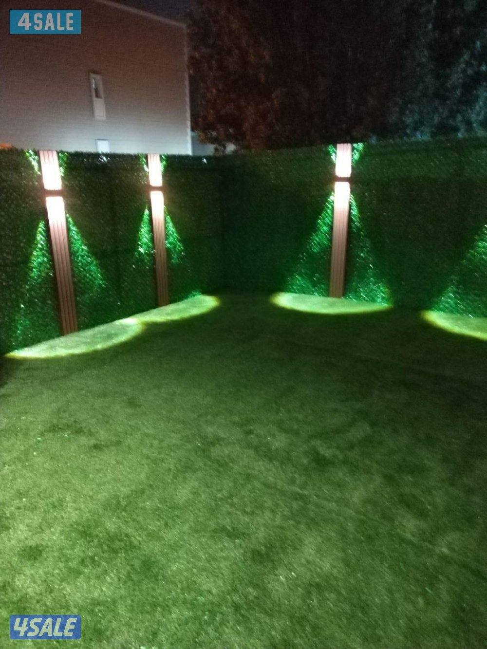 تركيب الثيل الصناعي وتركيب السياج التركي وقص الاشجار11